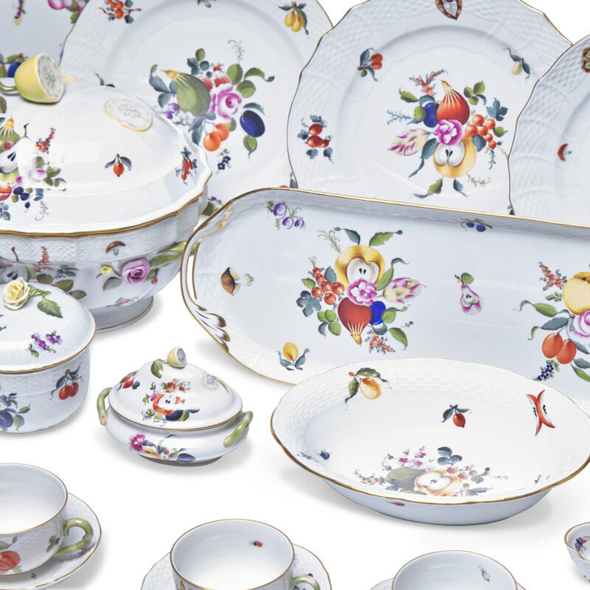 A Herend Fruits and Flowers Porcelain Dinner Service...
