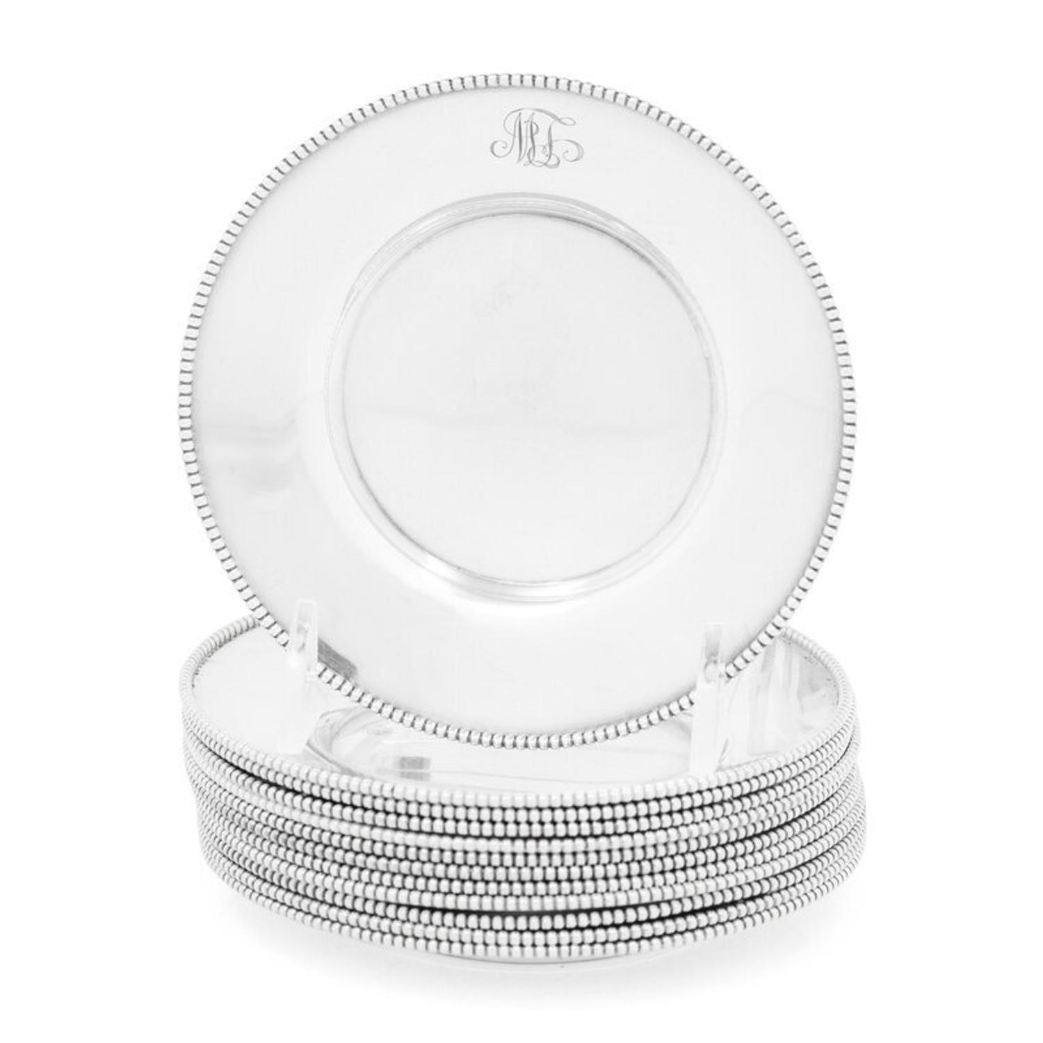 A Set of Twelve American Silver Bread Plates
