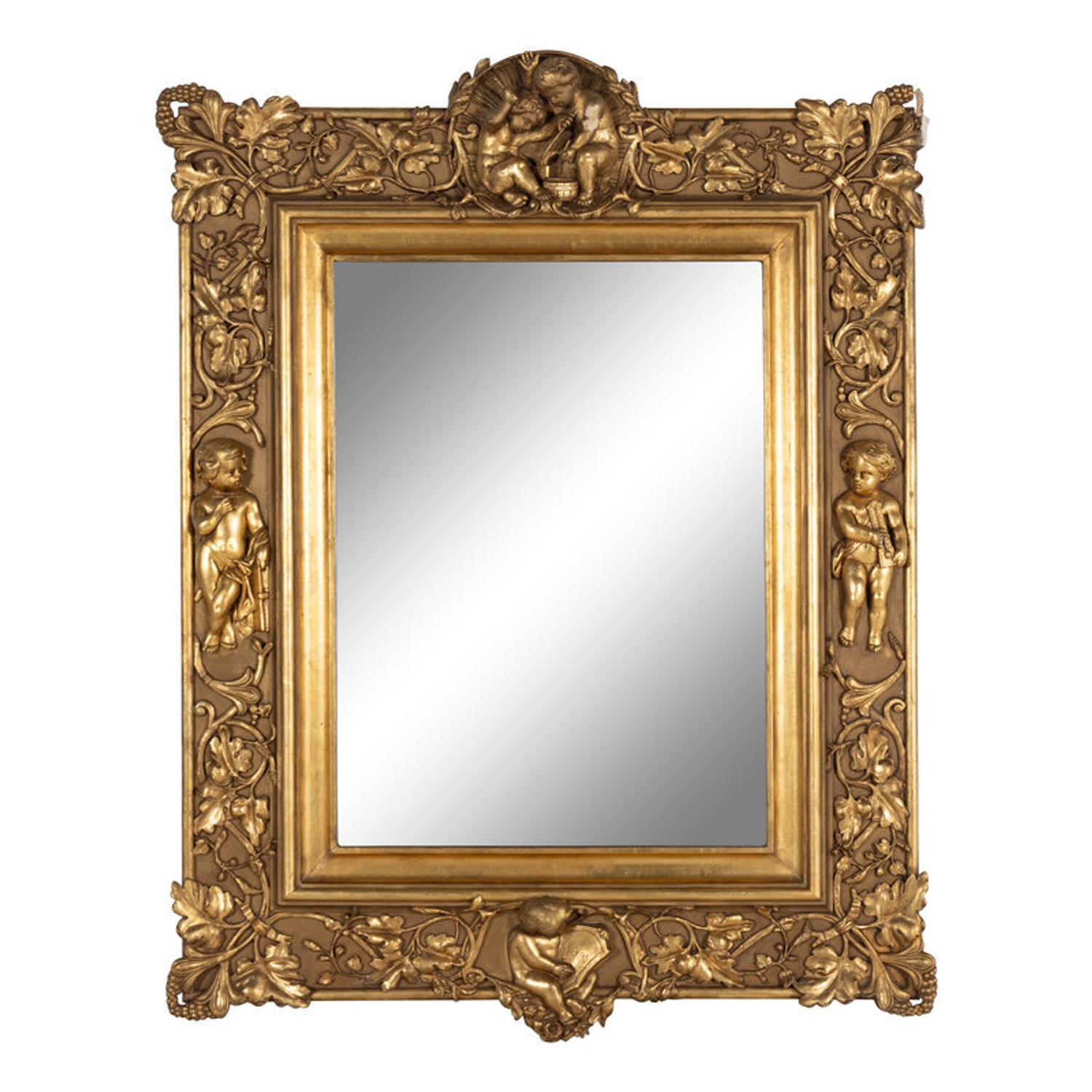 A Baroque Style Carved Giltwood and Gesso Figural Mirror