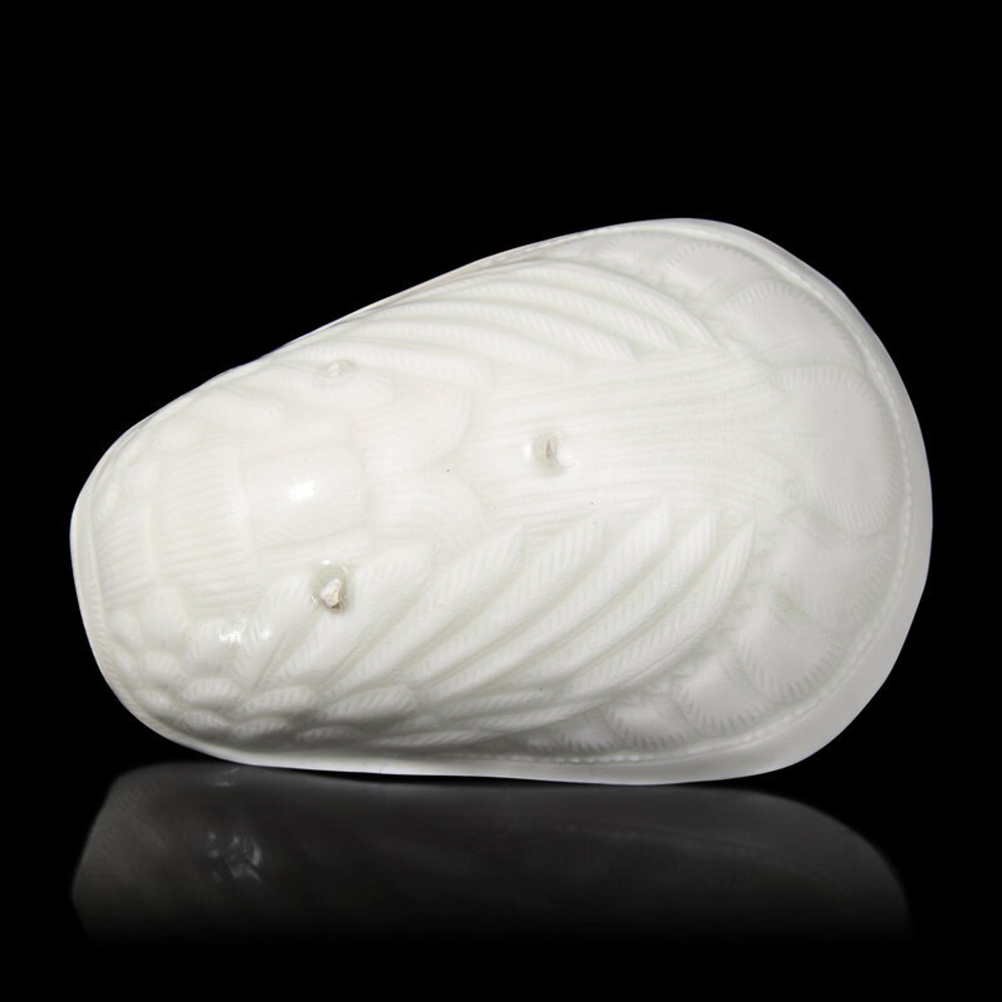 A Chinese Transparent Glazed 'Parrot' Cup, Song Dynasty 宋 白瓷鸚鵡杯