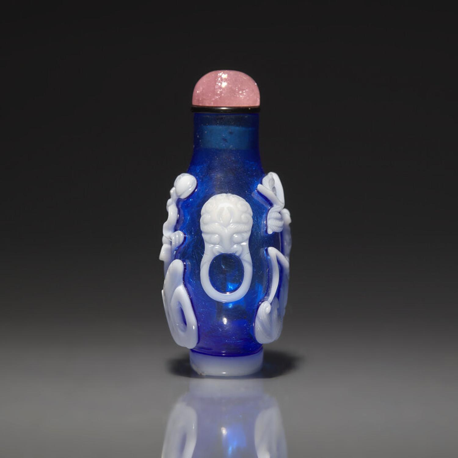 A Chinese White Overlay Blue Glass Snuff Bottle, Qing Dynasty, Possibly 18th-Early 19th Century 清中期 寶石藍地套涅白料垂釣圖鼻烟壺