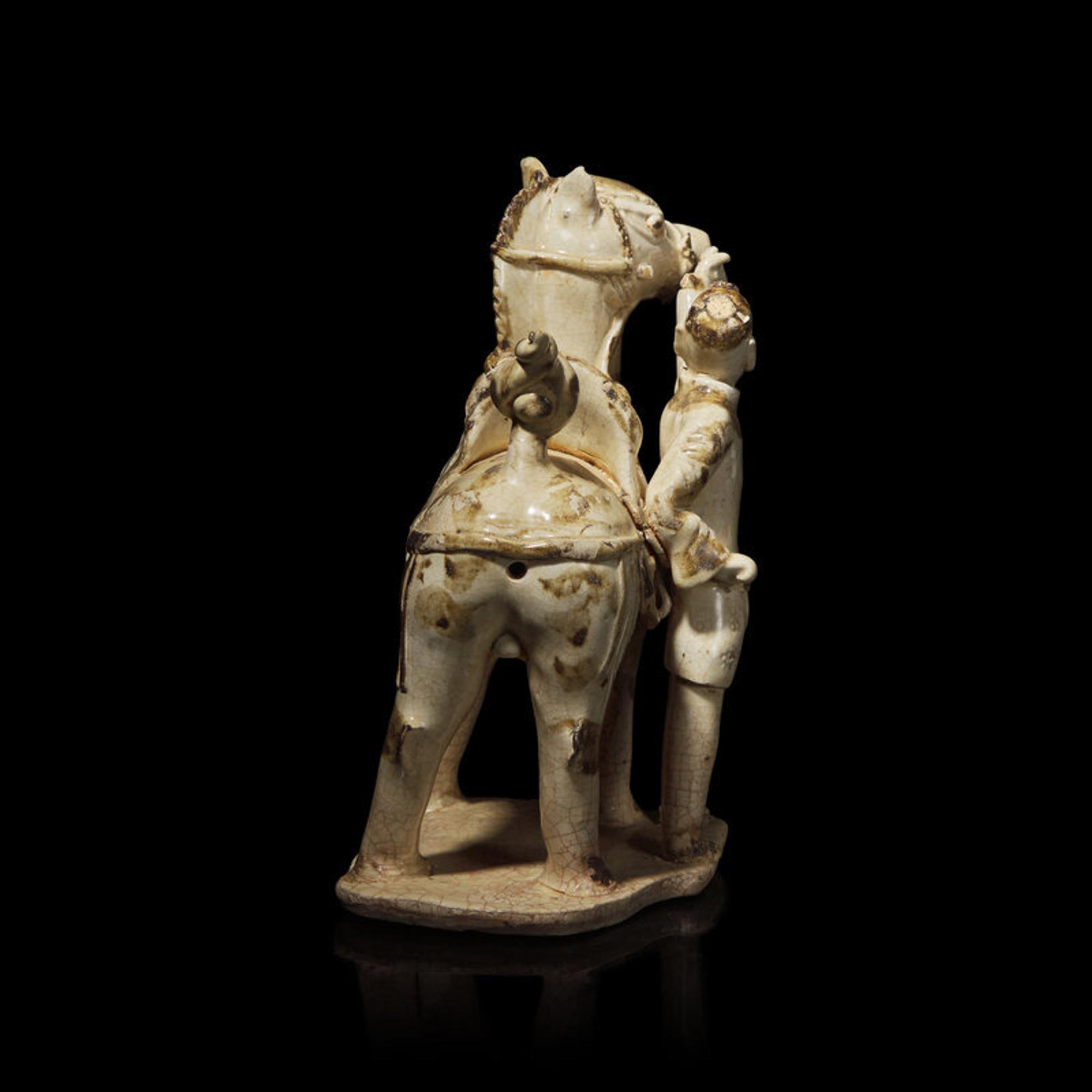 A Chinese Qingbai Iron-Brown Splashed Equestrian Figural Group, Northern Song Dynasty 北宋 湖田點褐彩胡人牽馬俑