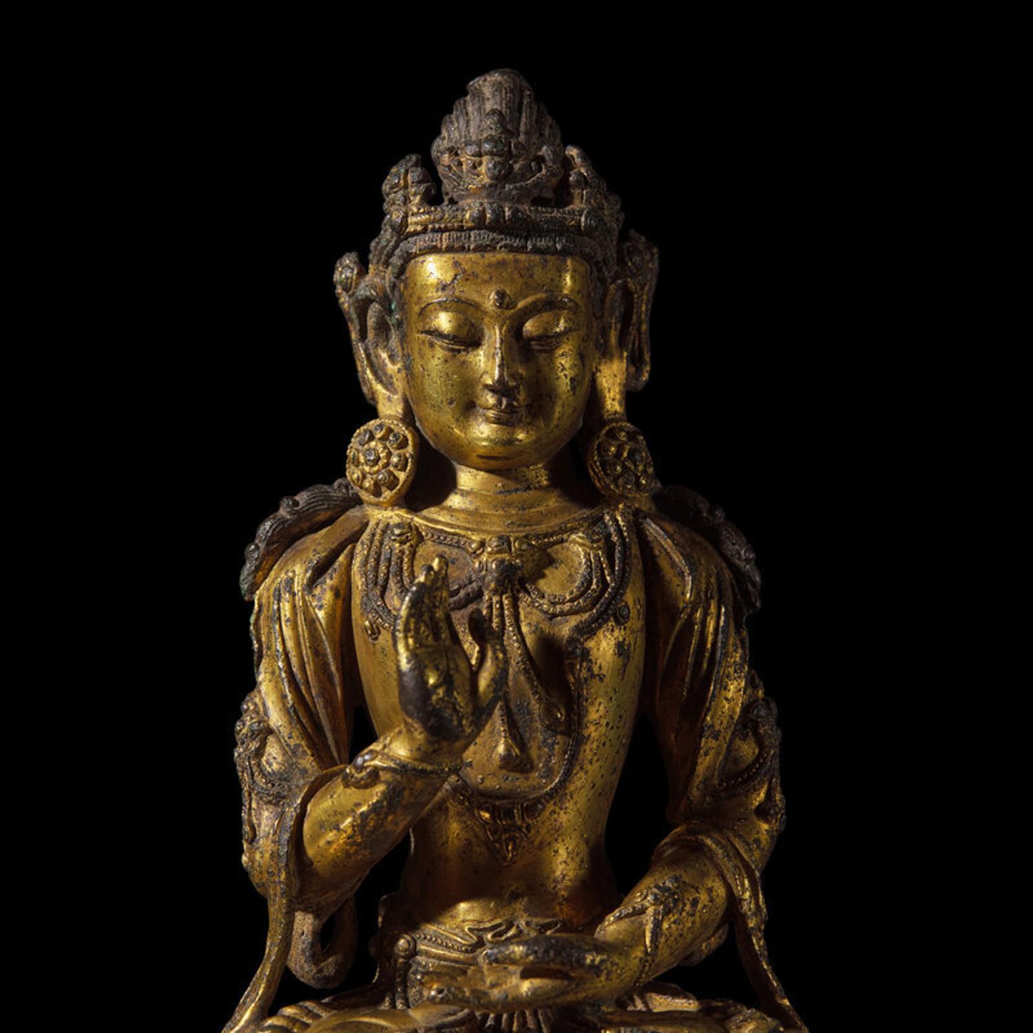 A Chinese Gilt Bronze Figure of a Seated Bodhisattva, Ming Dynasty, 15th Century 明 銅鎏金菩薩坐像