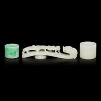 Two Chinese Jade and Jadeite Archer's Rings and a Jade 'Dragon' Belt Hook, Qing Dynasty 清 白玉、翡翠扳指及龍鈎一組三件