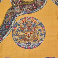 A Chinese Yellow Kesi Dragon Roundel Robe, Late 19th Century 清晚期 黃地緙絲龍袍