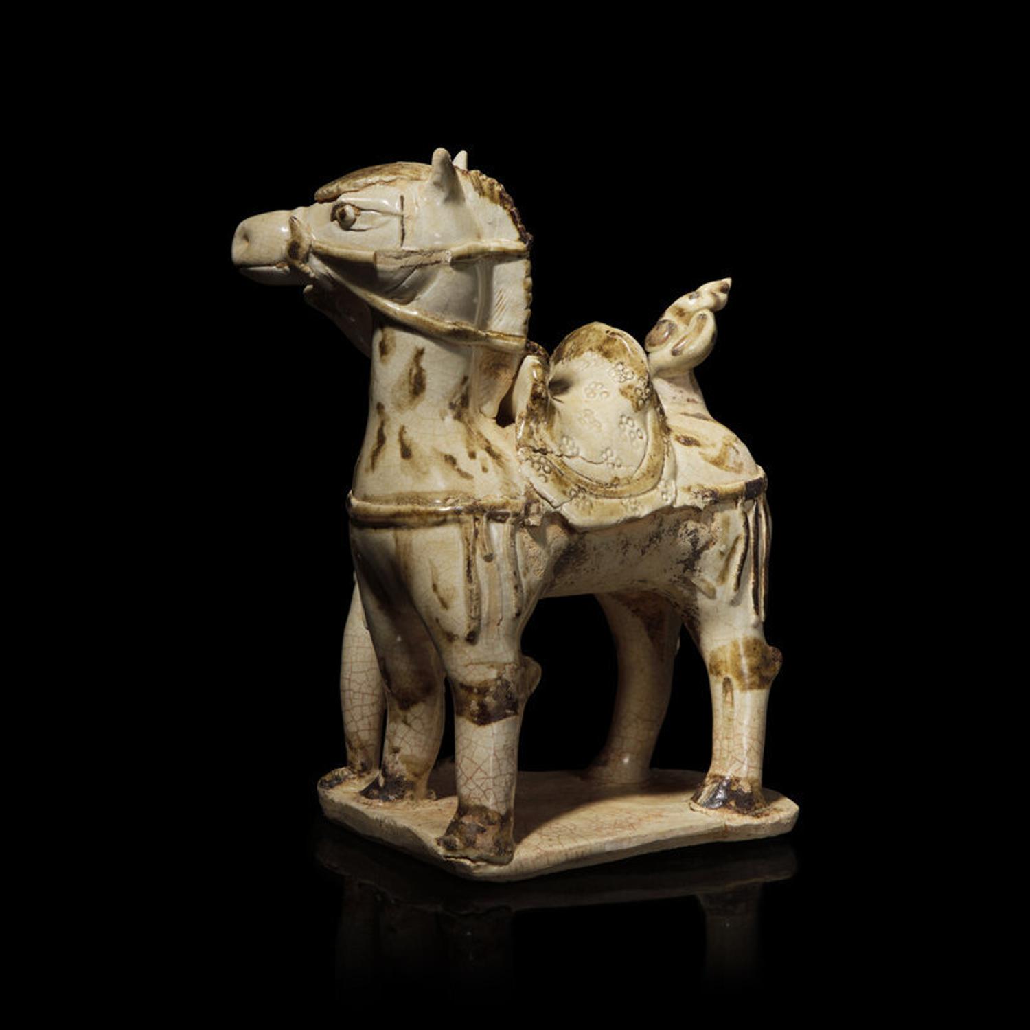 A Chinese Qingbai Iron-Brown Splashed Equestrian Figural Group, Northern Song Dynasty 北宋 湖田點褐彩胡人牽馬俑