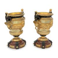 A Pair of French Egyptian Revival Gilt Bronze and Marble Urns