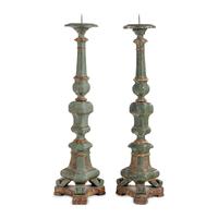 An Associated Pair of Italian Baroque Style Painted and Parcel Gilt Floor Prickets