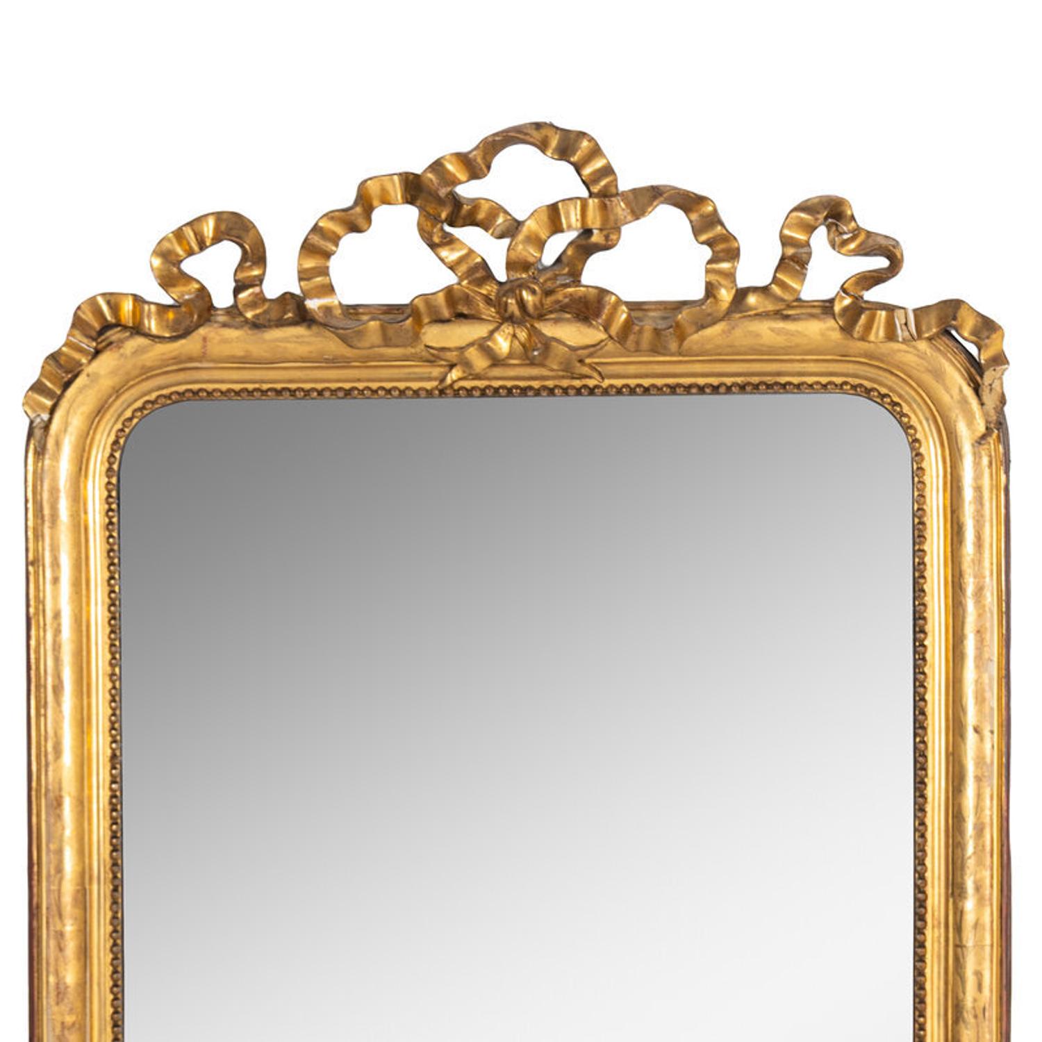 A Napoleon III Carved Giltwood Mirror