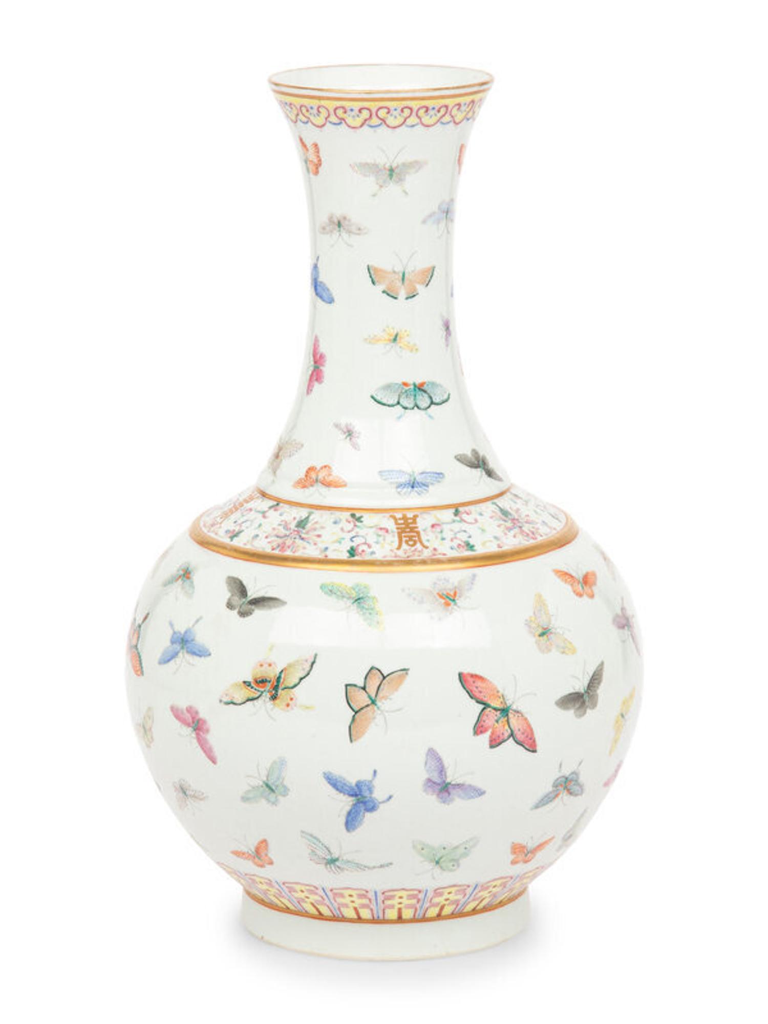 A Chinese Famille Rose 'Butterflies' Bottle Vase, Guangxu Six-Character Mark 光緒款 粉彩百蝶圖賞瓶