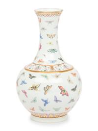 A Chinese Famille Rose 'Butterflies' Bottle Vase, Guangxu Six-Character Mark 光緒款 粉彩百蝶圖賞瓶