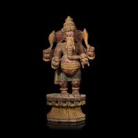 An Indian Carved and Polychromed Wood Figure of Ganesh, Late 19th to Early 20th Century