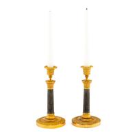 A Pair of Continental Gilt and Patinated Bronze Candlesticks