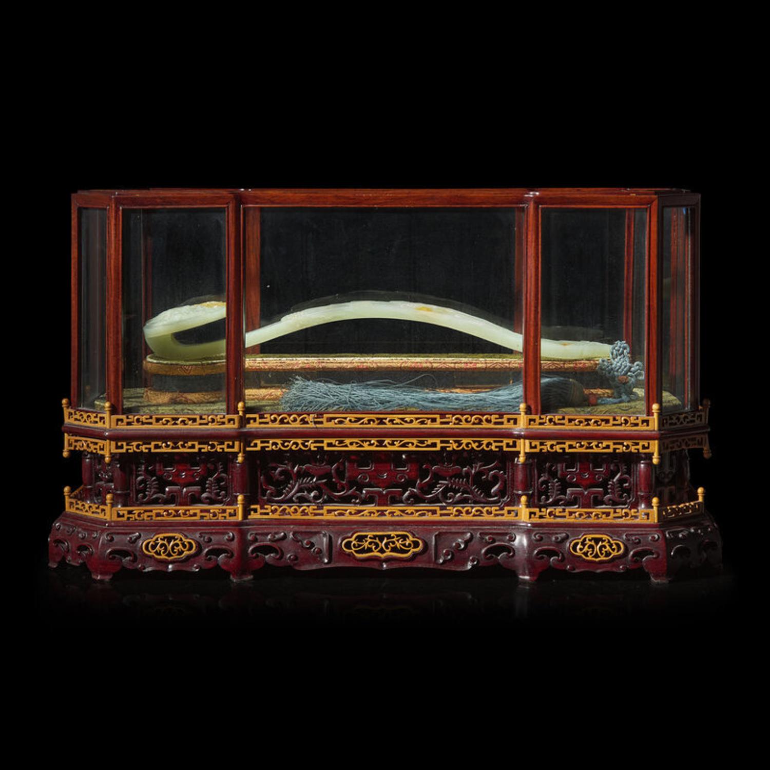 A Chinese Celadon and Russet Jade Ruyi Scepter, 20th Century 近代 青玉如意配匣