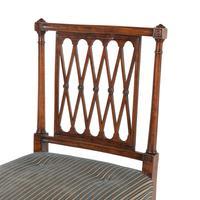 A Set of Eight George III Mahogany Lattice-Back Dining Chairs