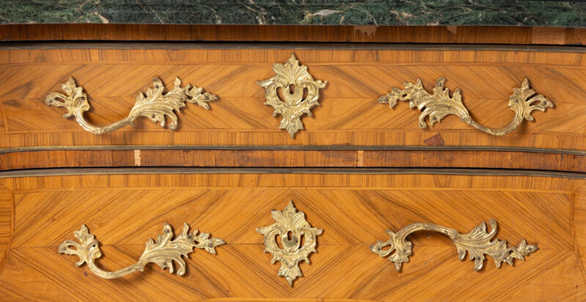 A Pair of Régence Style Gilt Bronze Mounted Tulipwood Marble-Top Commodes