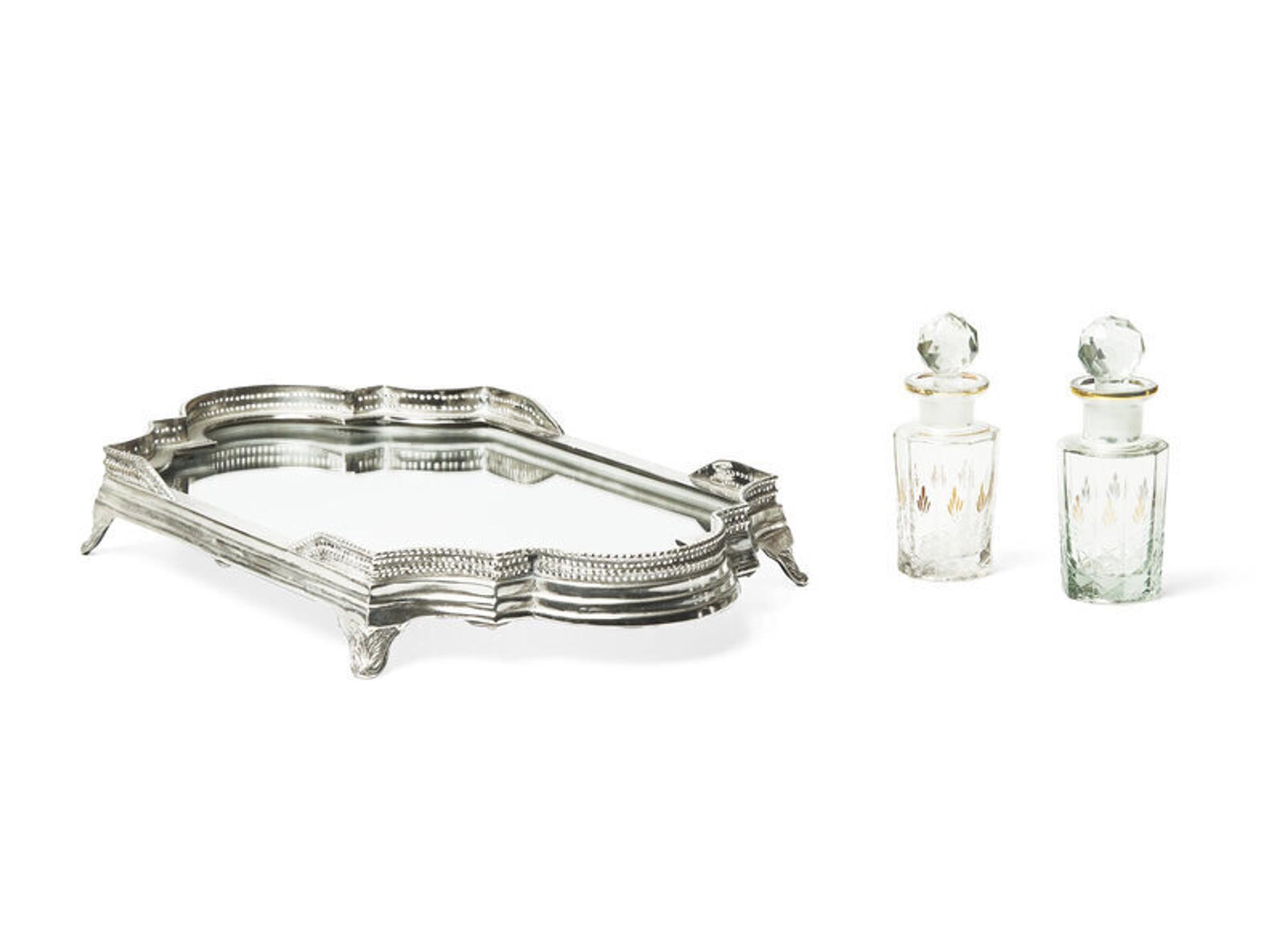A Silver-Plate and Mirrored Table Plateau and a Pair of Cut Glass Decanters