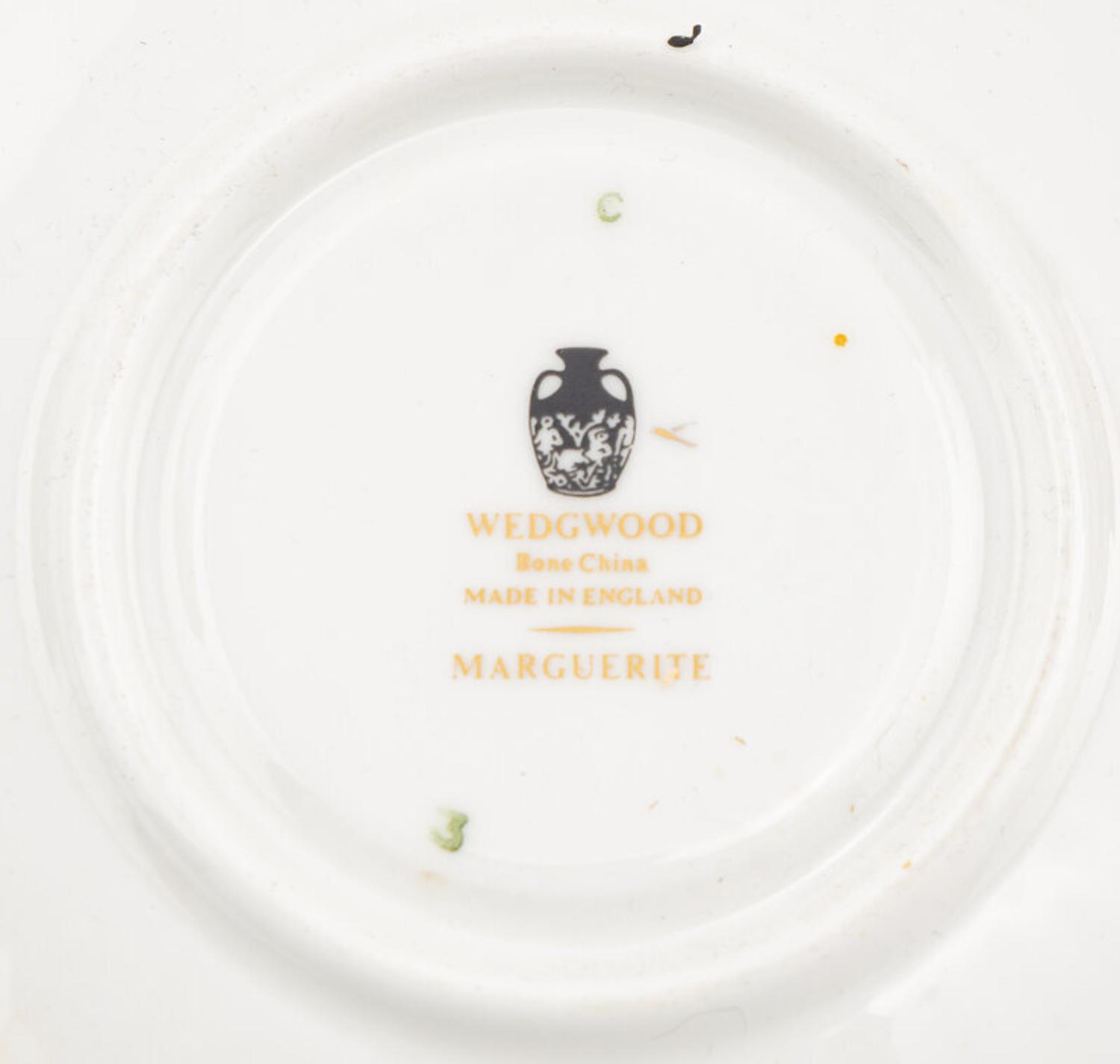A Wedgwood Marguerite Porcelain Dinner Service
