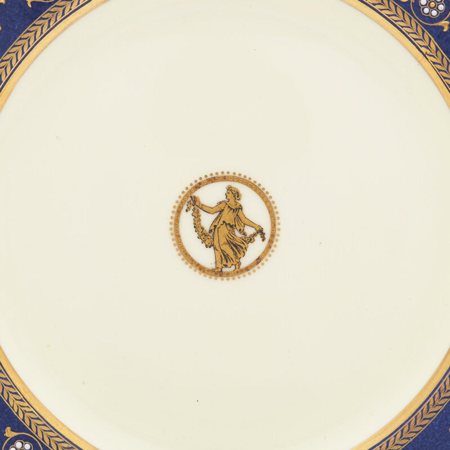A Set of Twelve Wedgwood Porcelain Dinner Plates