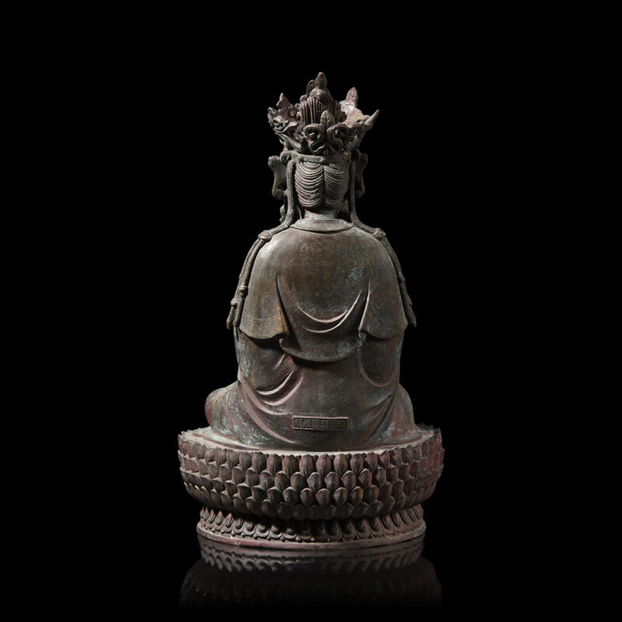 A Chinese Patinated Bronze Figure of a Seated Bodhisattva 銅觀音坐像