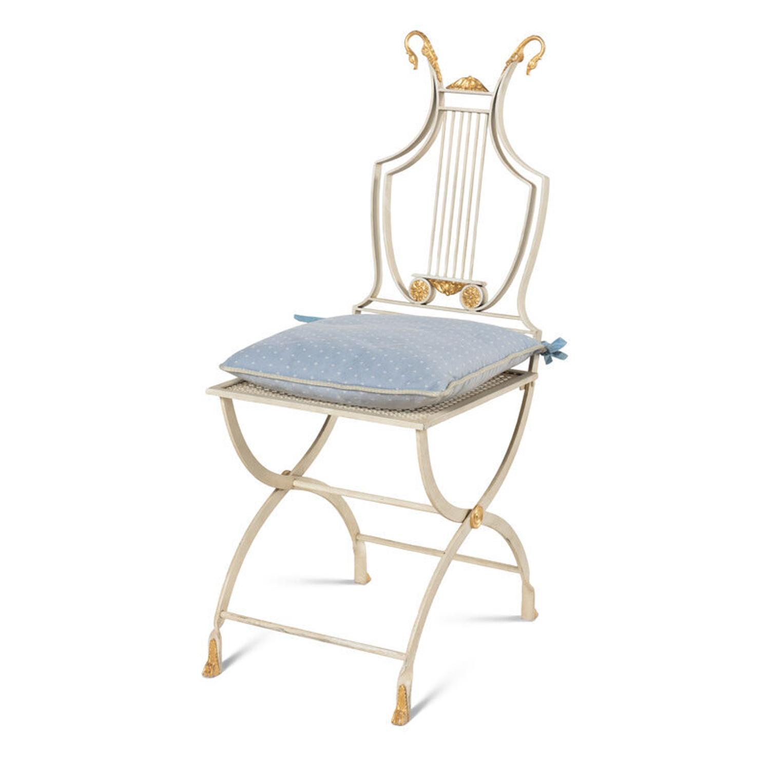 A Set of Six Neoclassical Style Cream-Painted and Parcel Gilt Garden Chairs