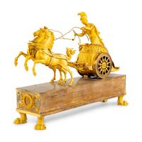 An Empire Gilt Bronze Figural Mantel Clock