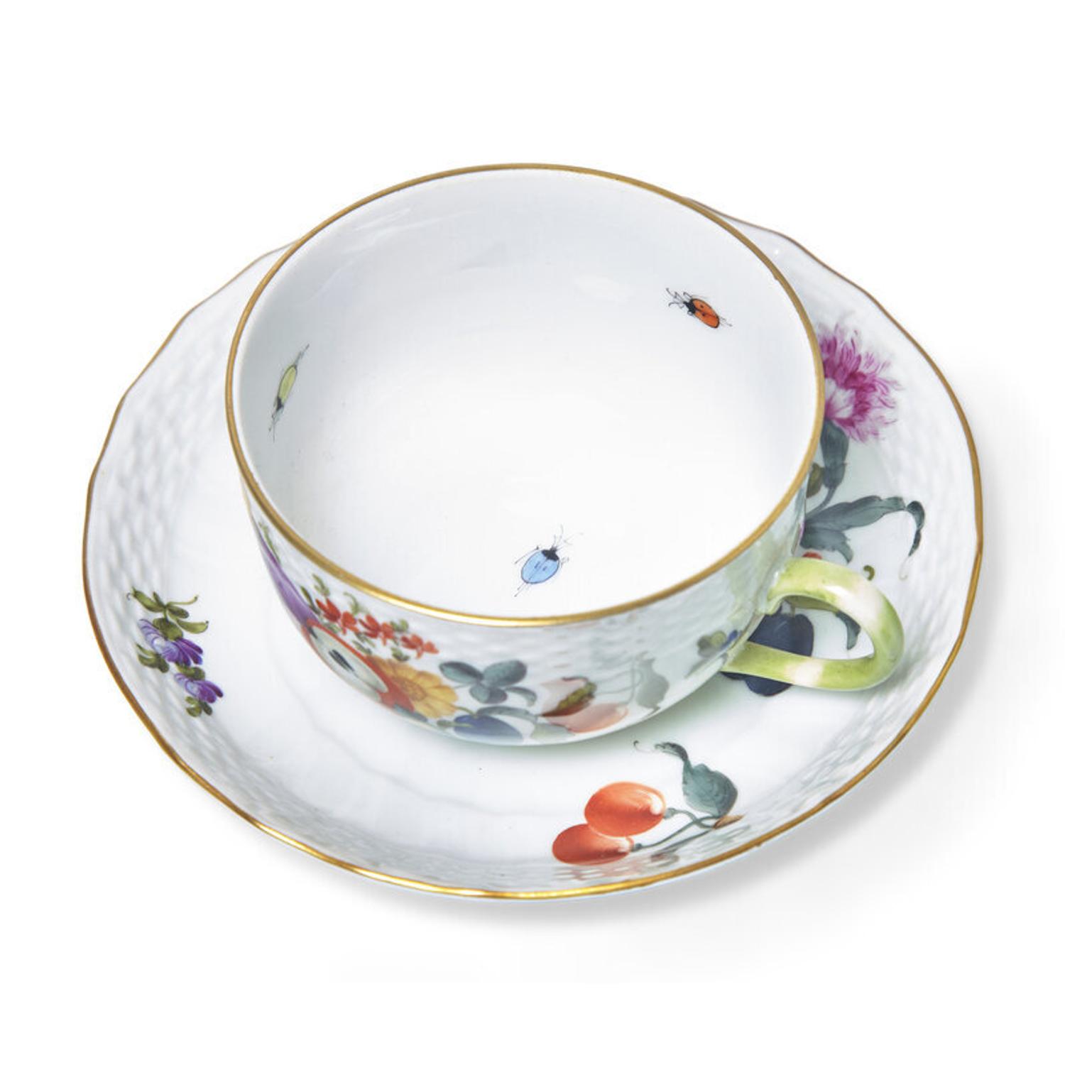 A Herend Fruits and Flowers Porcelain Dinner Service...