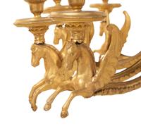An Empire Giltwood Twelve-Light Chandelier