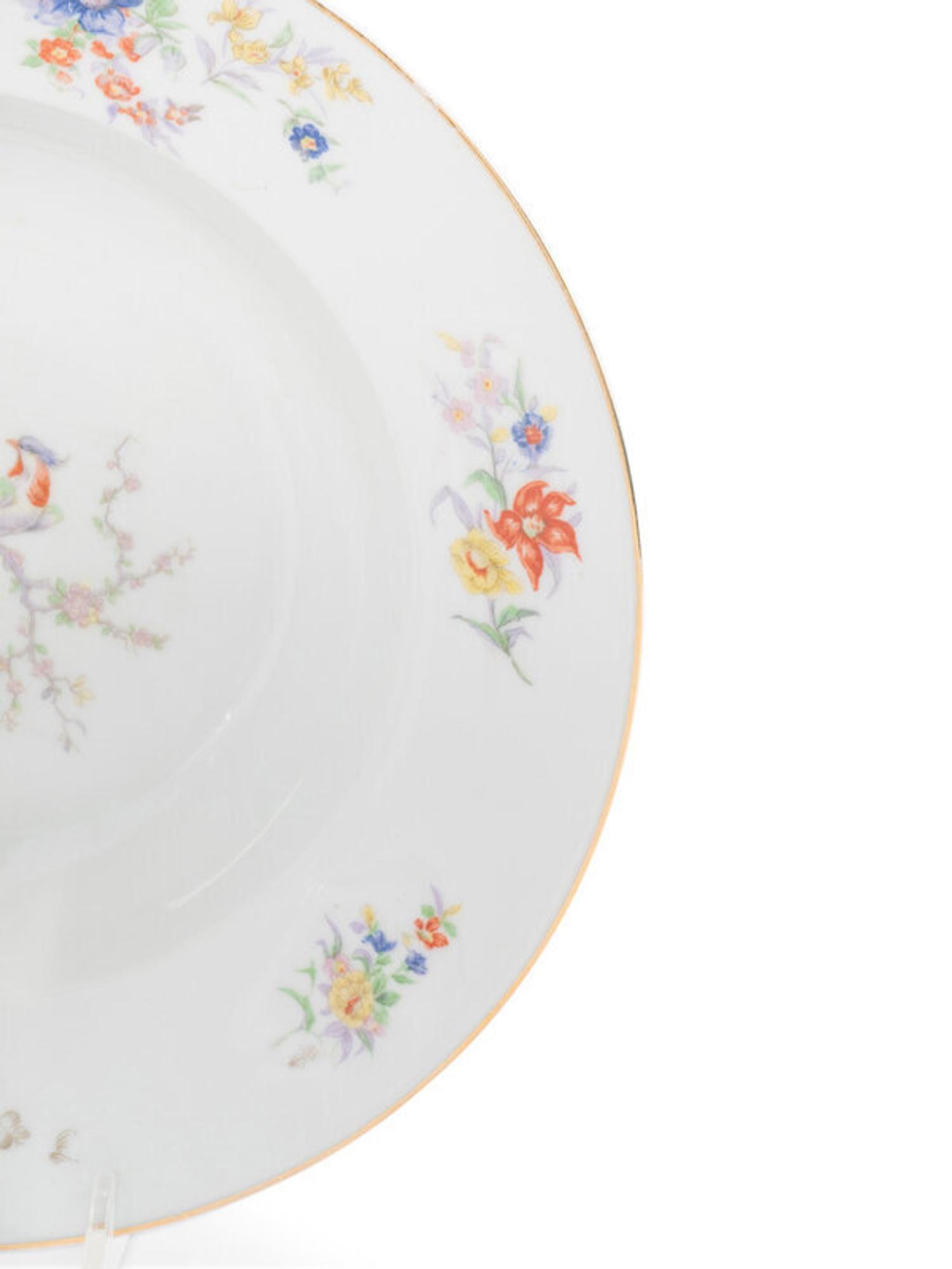 A German Porcelain Dinner Service —