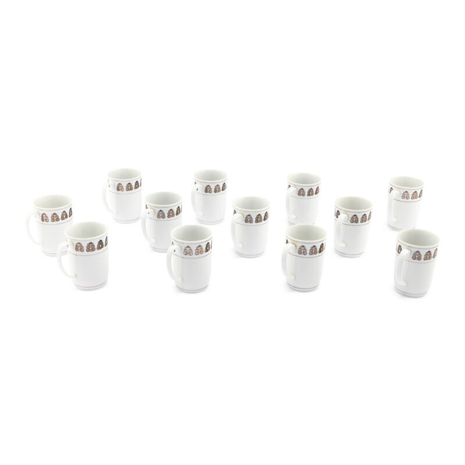 A Set of Twelve Georg Jensen Acorn Porcelain Coffee Mugs