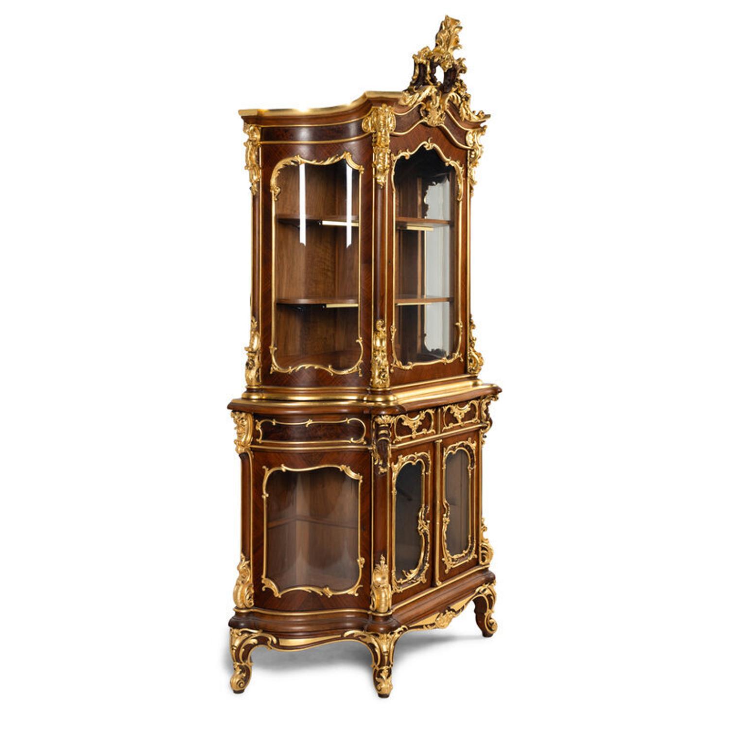 A Louis XV Style Parcel Gilt Mahogany Cabinet à Deux Corps