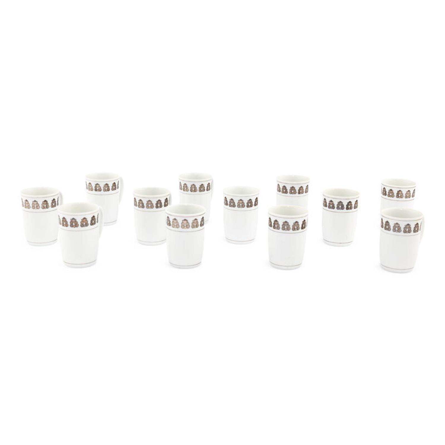 A Set of Twelve Georg Jensen Acorn Porcelain Coffee Mugs