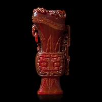 A Chinese Carved Amber Archaistic Gong Vase and Cover, Late Qing Dynasty 清晚期 琥珀仿古觥
