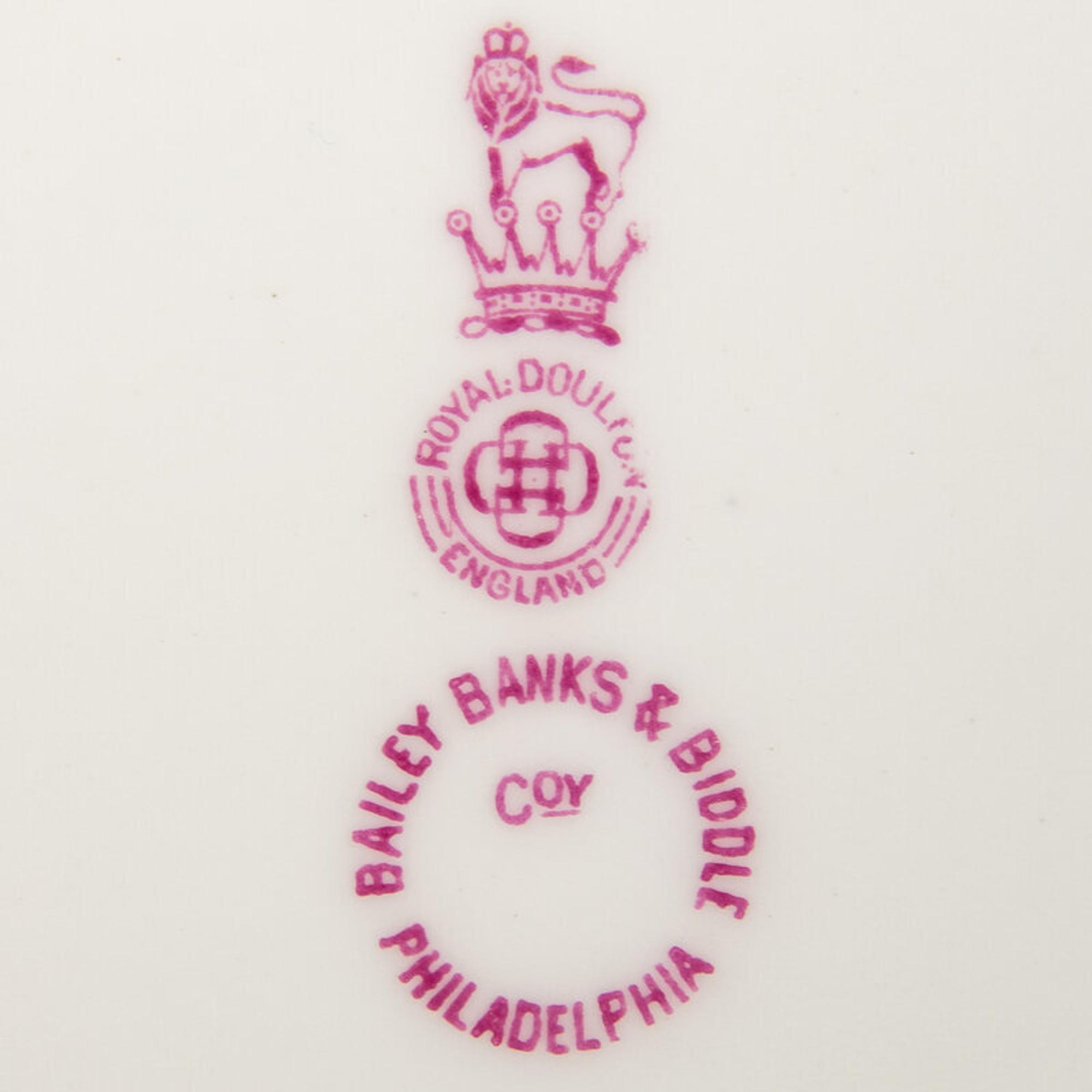 A Set of Thirteen Royal Doulton Porcelain Cabinet Plates