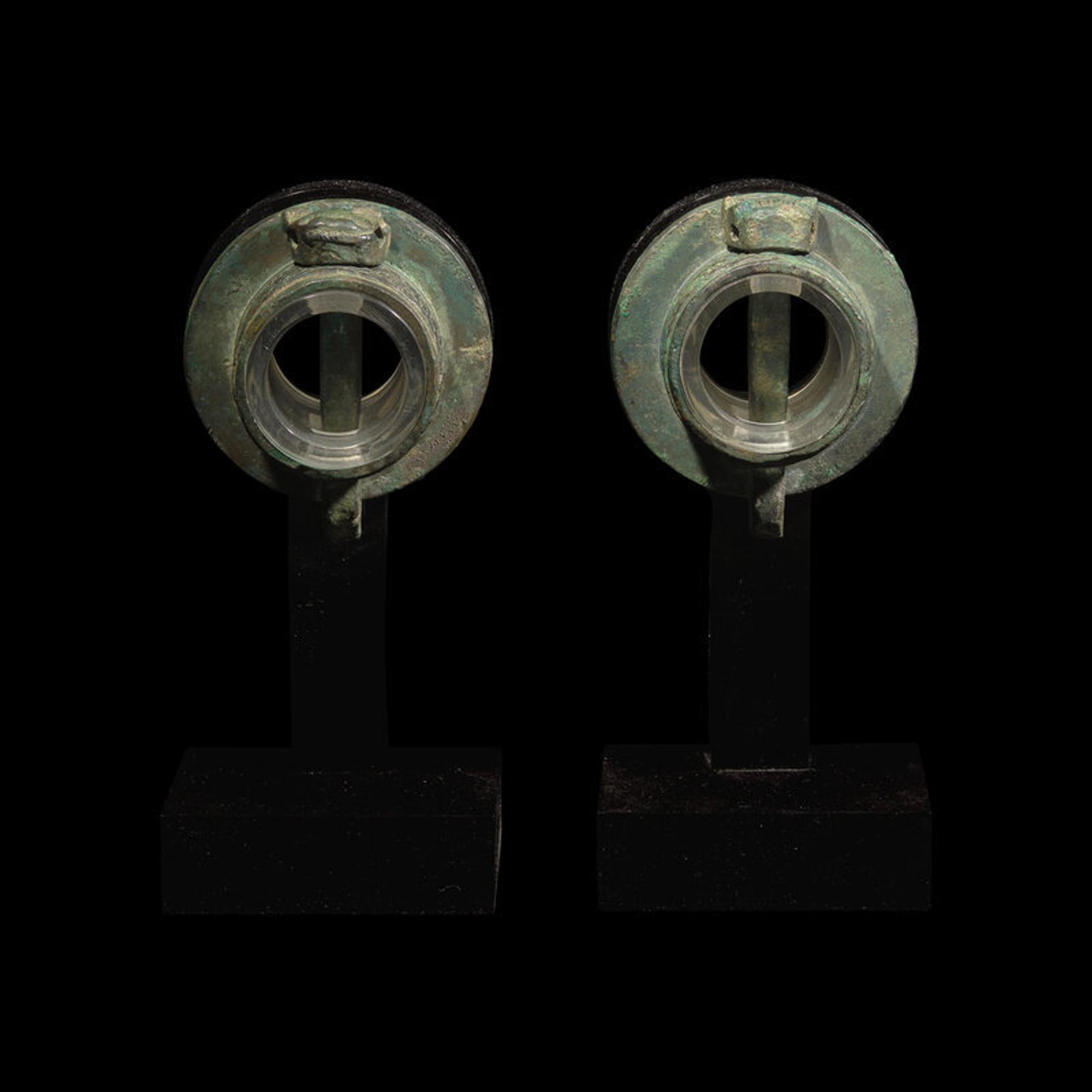 A Pair of Chinese Bronze Chariot Fittings 青銅獸面紋車軎