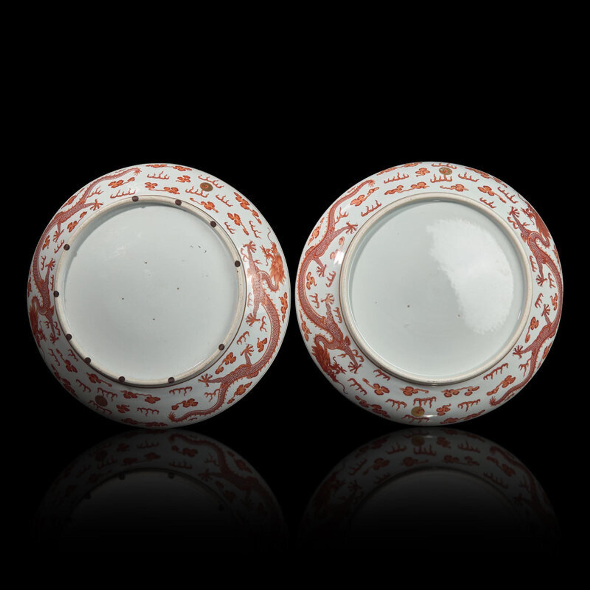 A Pair of Large Chinese Iron-Red Decorated 'Dragons' Chargers, Late Qing Dynasty 清晚期 礬紅彩龍戲珠賞盤一對