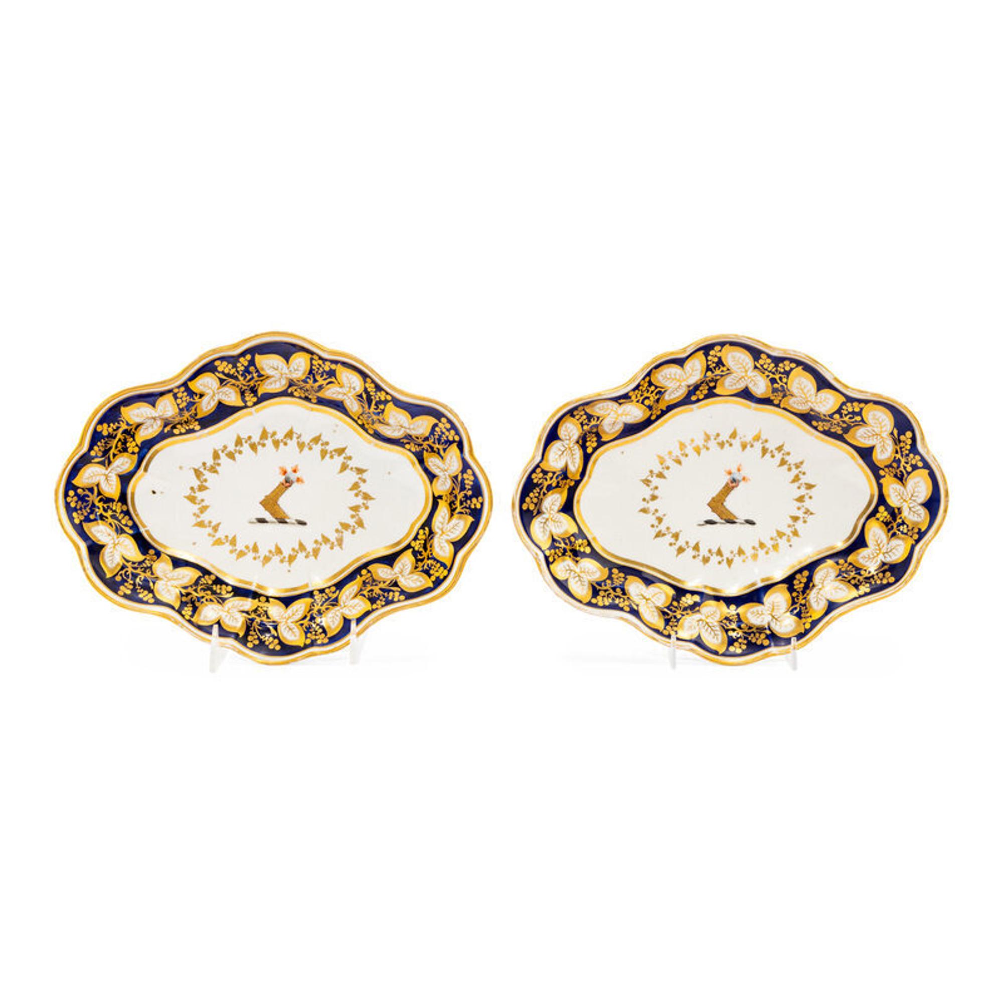 A Pair of Worcester Porcelain Armorial Serving Dishes