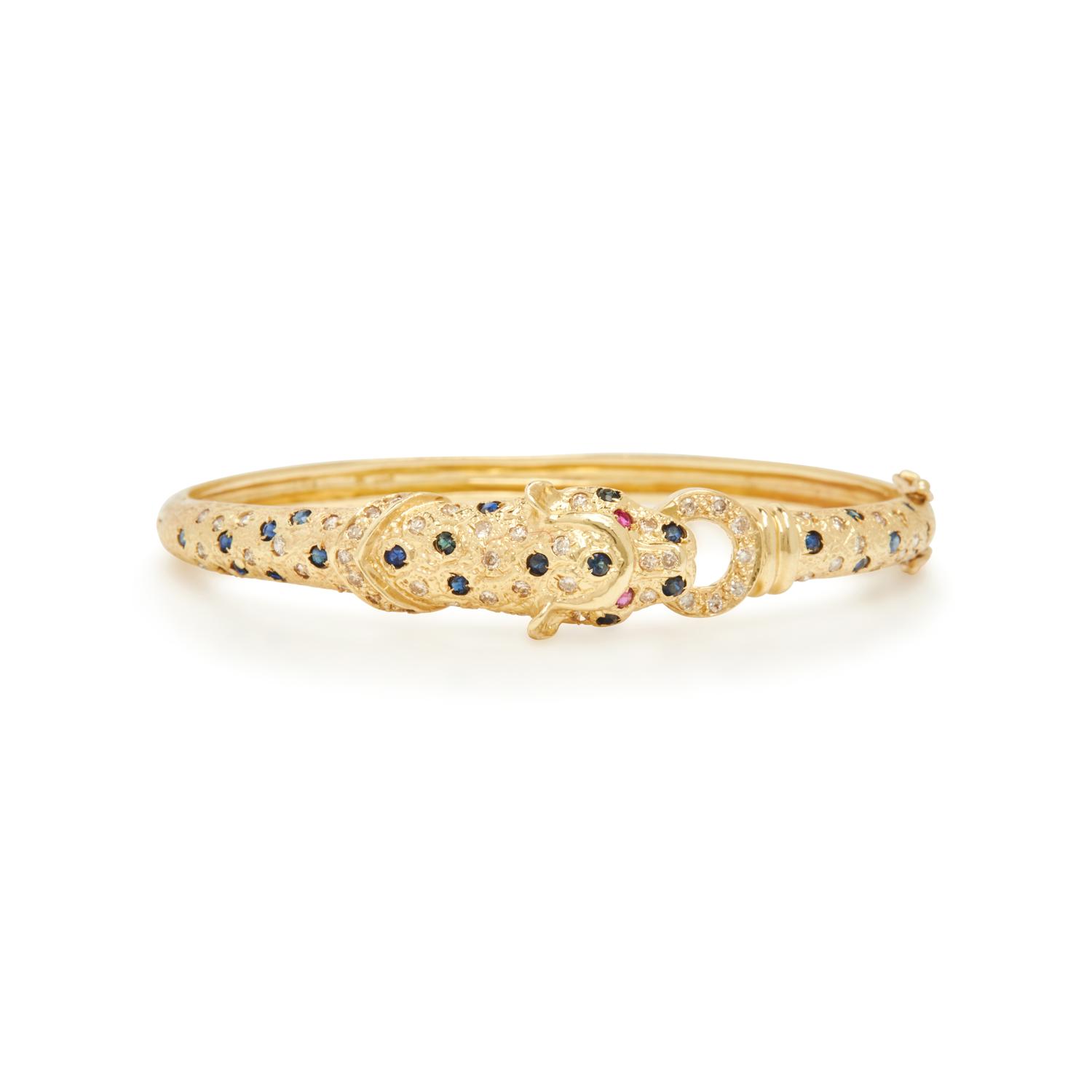 YELLOW GOLD AND GEMSTONE PANTHER BANGLE BRACELET