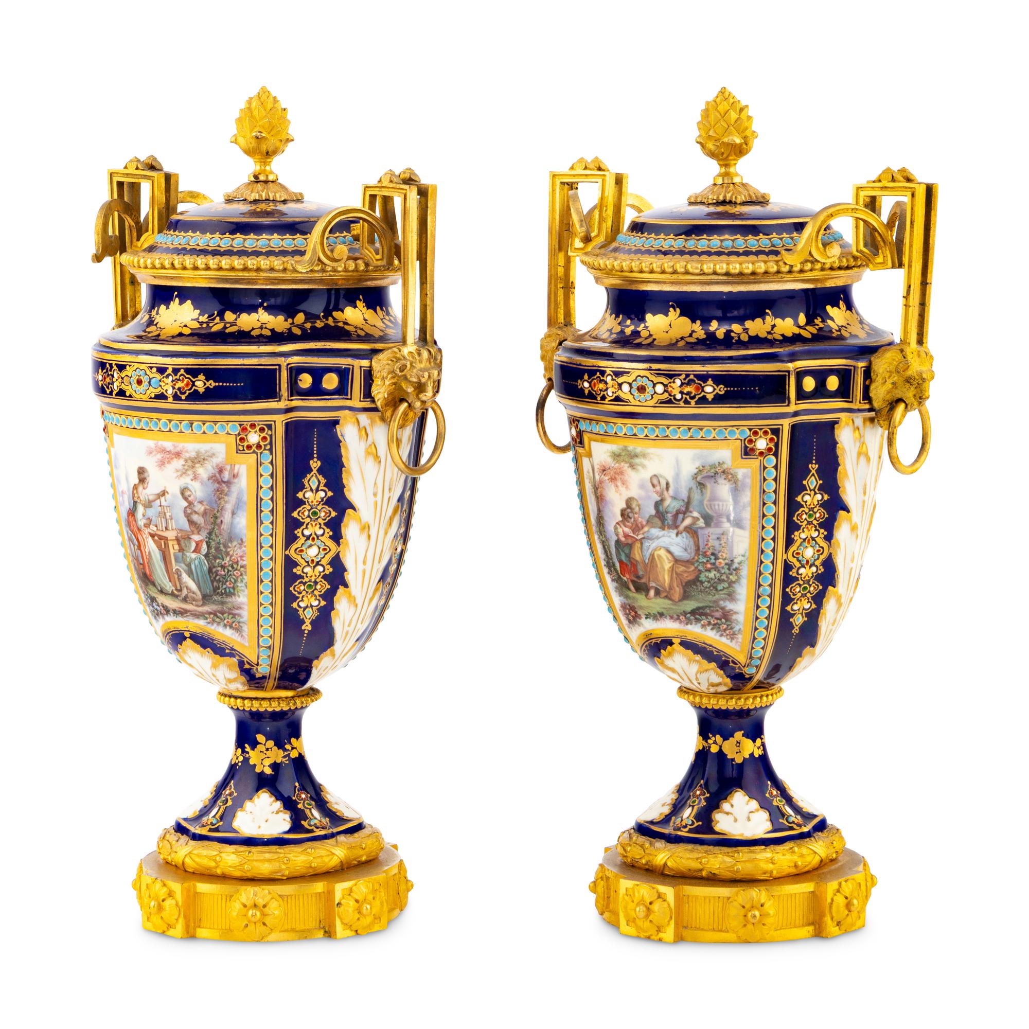 A Pair of Sèvres Style Porcelain, Enameled and Gilt Bronze Mounted Urns