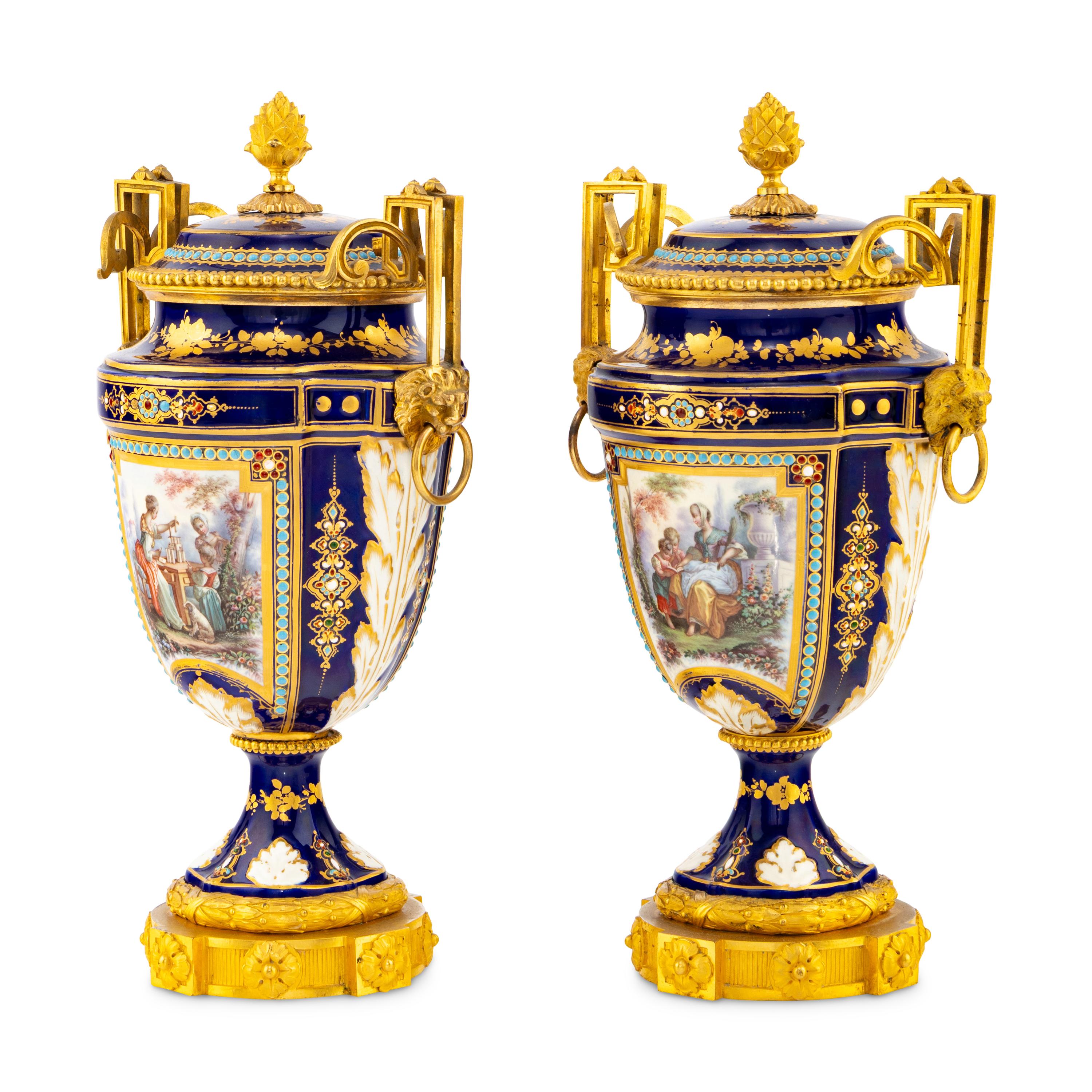 A Pair of Sèvres Style Porcelain, Enameled and Gilt Bronze Mounted Urns