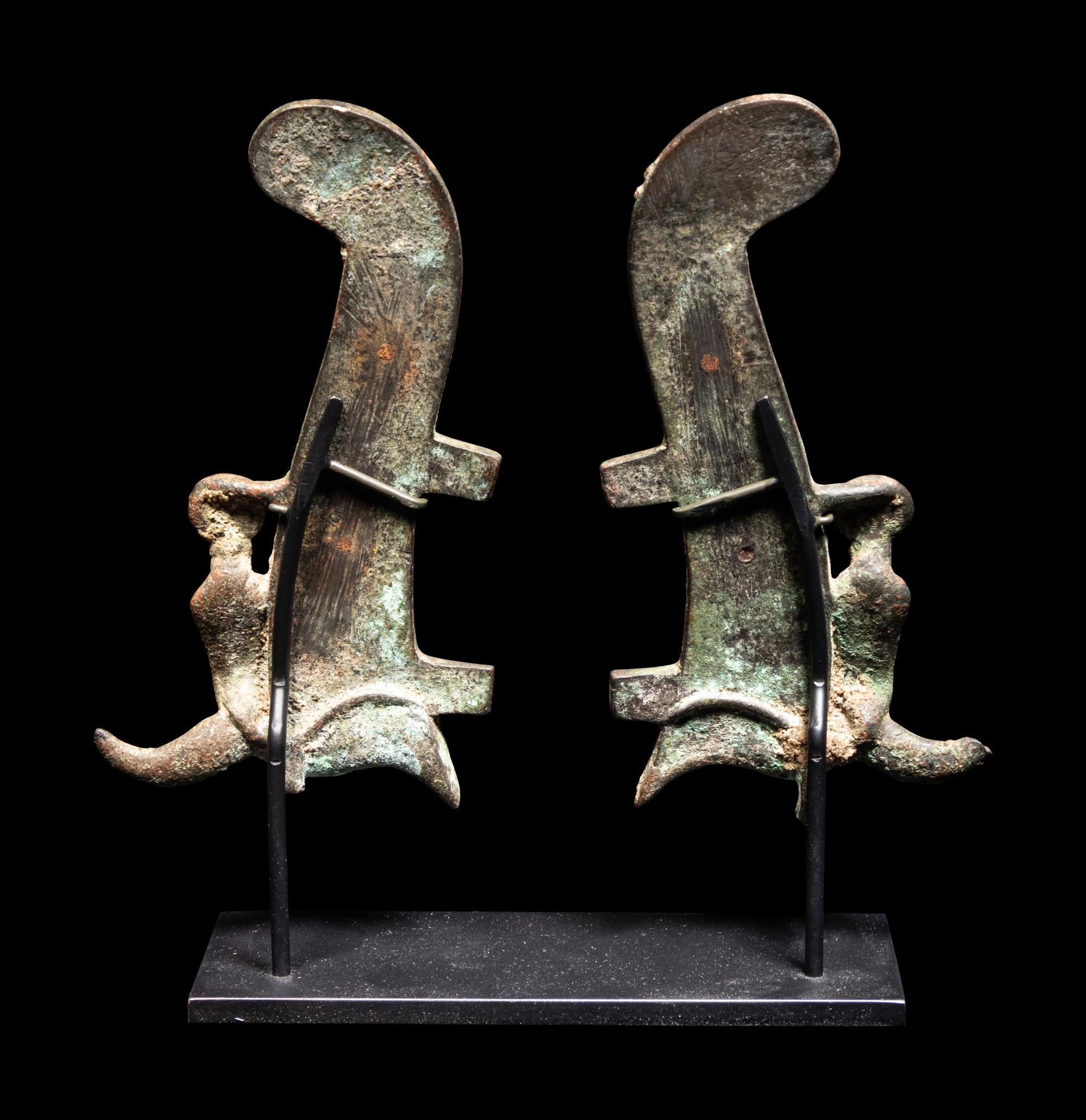 A Pair of Egyptian Bronze Ostrich Plumes