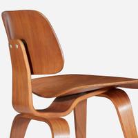 Charles Eames (American, 1907-1978) & Ray Eames (American, 1912-1988) Pair of "DCW" Lounge Chairs, USA, Designed 1946, the Present Lot circa 1950s