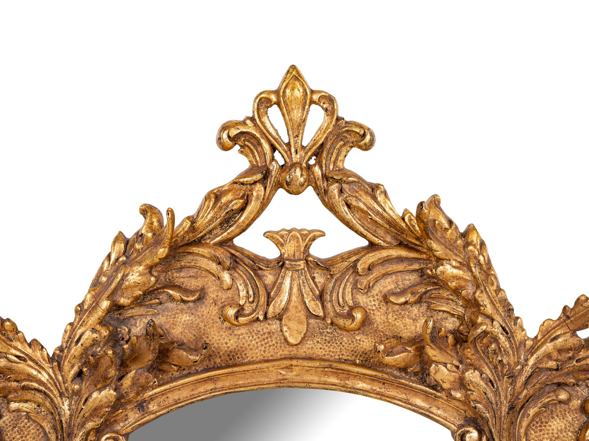 A Baroque Style Giltwood Mirror