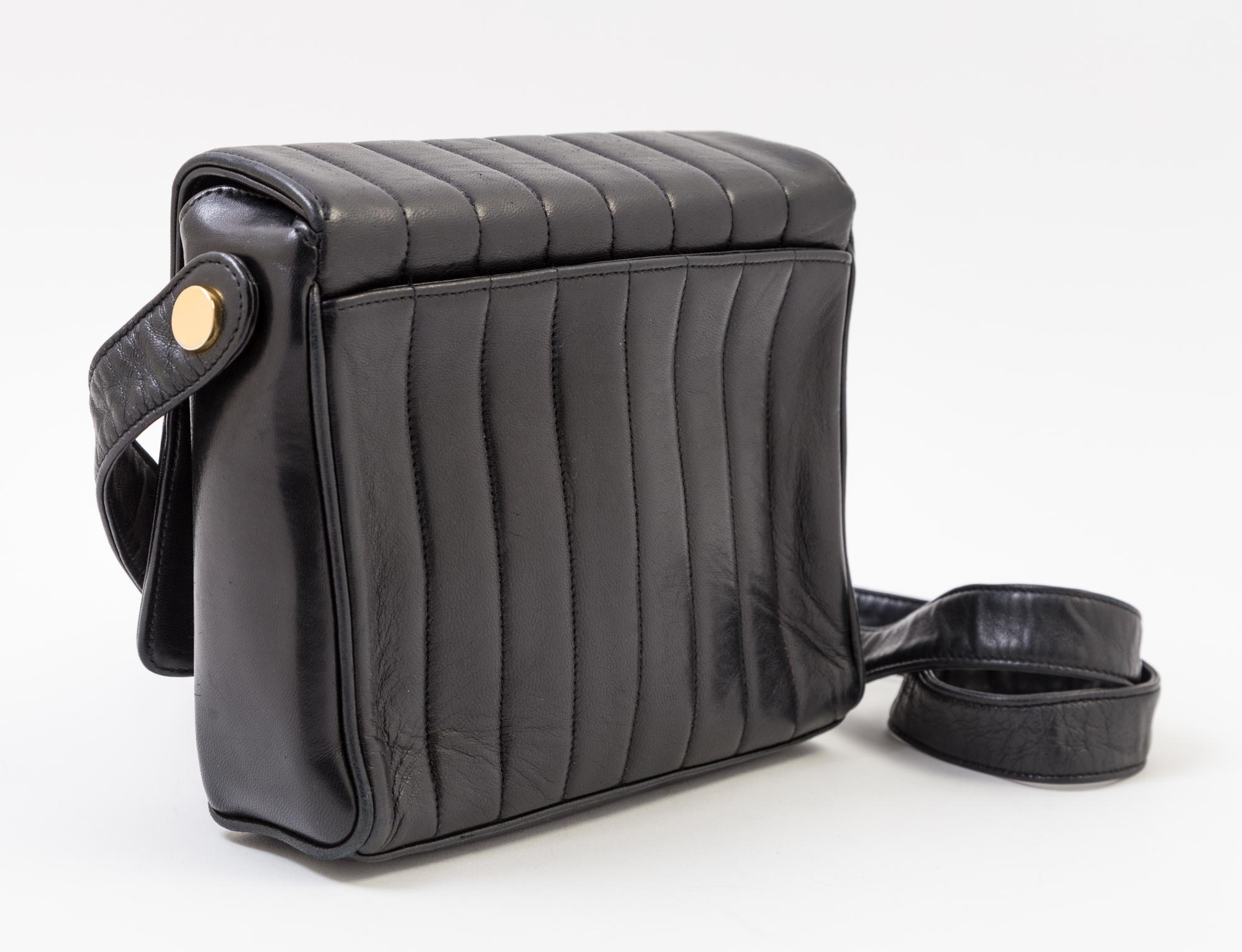 A Chanel Black Lambskin Vertical Quilt Flap Shoulder Bag, 7.5" x 7" x 2". Strap drop: 19".