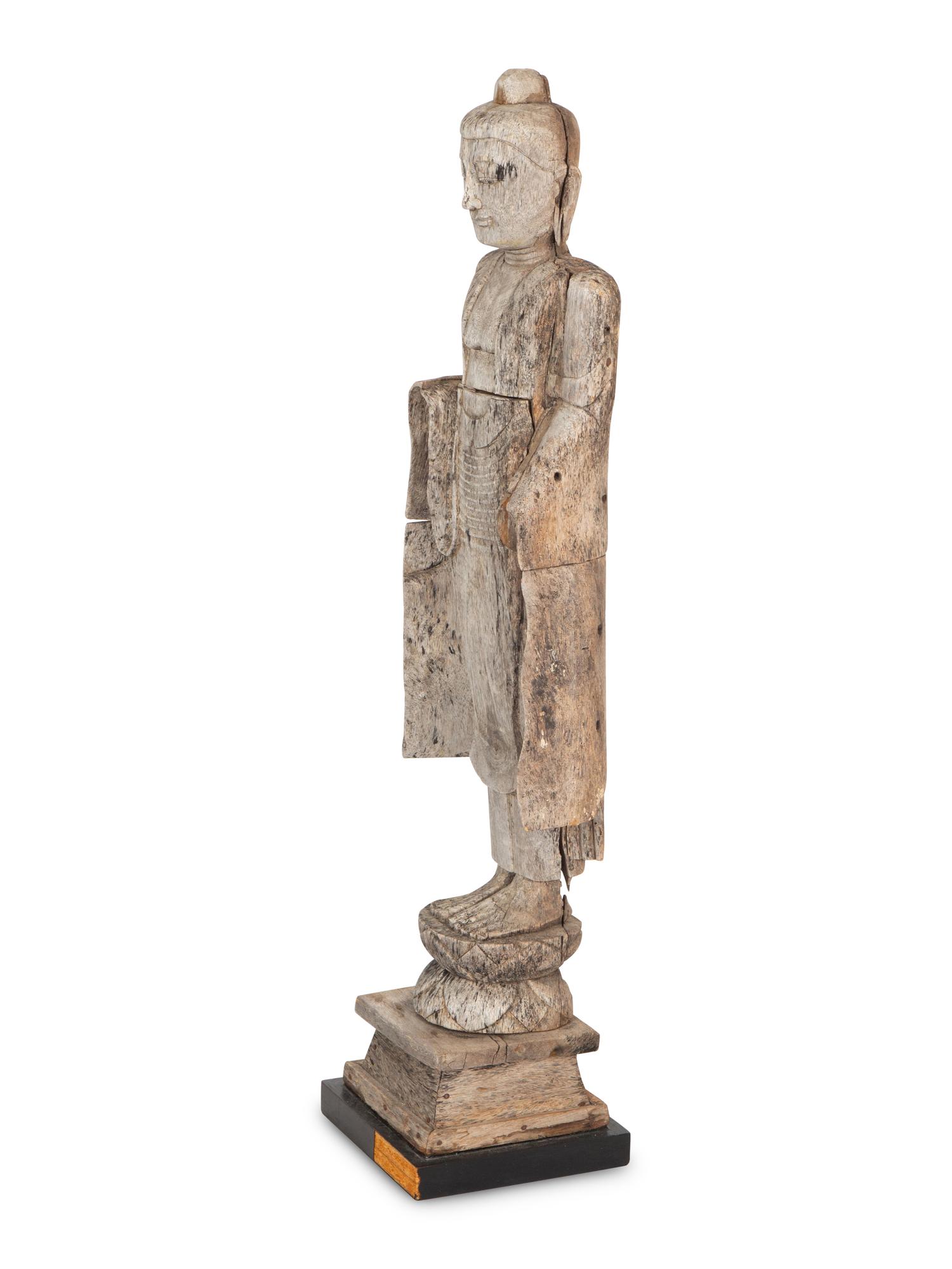 A Southeast Asian Carved Figure of Guan Yin