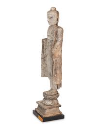 A Southeast Asian Carved Figure of Guan Yin