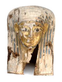 An Egyptian Painted Wood Sarcophagus Mask, Height 22 inches.
