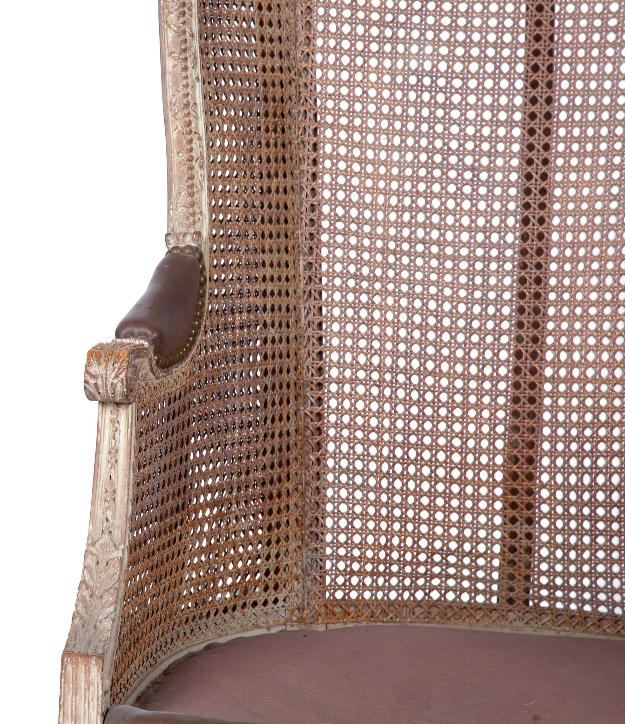 A Louis XVI Style Caned Bergere — LATE 19TH/EARLY 20TH CENTURY