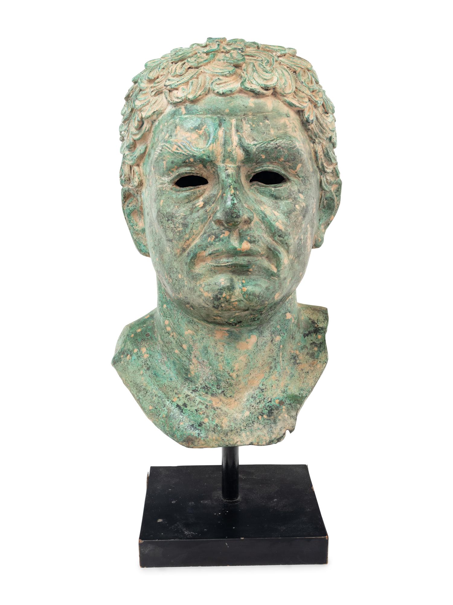 A Patinated Metal Portrait Head