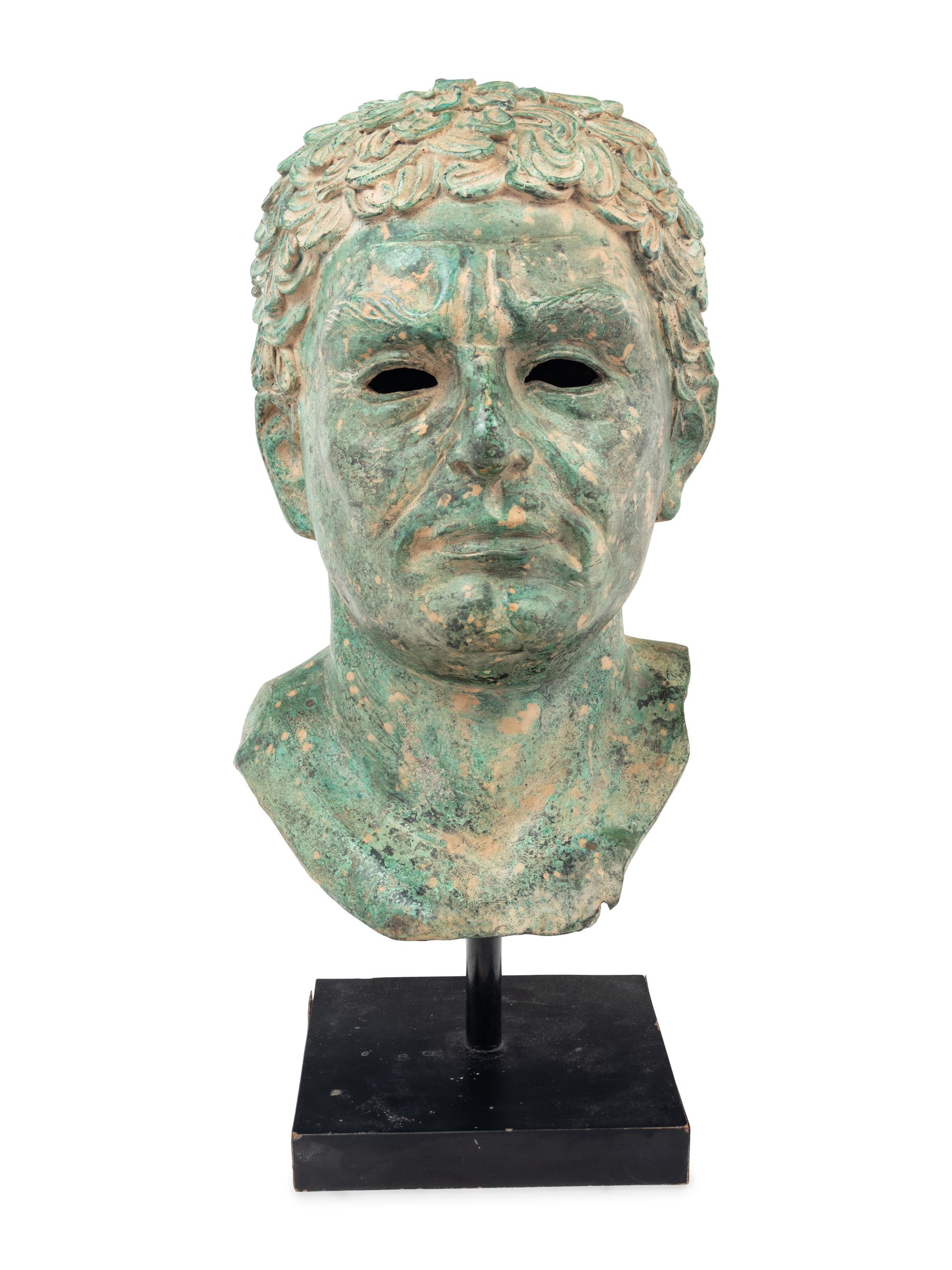 A Patinated Metal Portrait Head